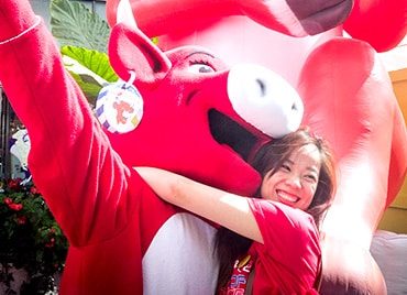 Bel employee w/ The Laughing Cow mascot