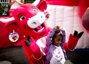 Child w/ The Laughing Cow mascot